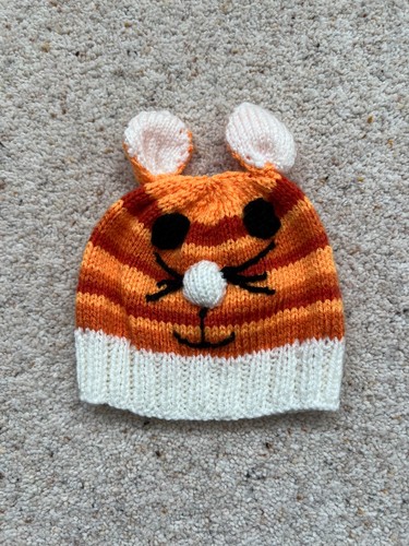 Hand knitted month old - hand,